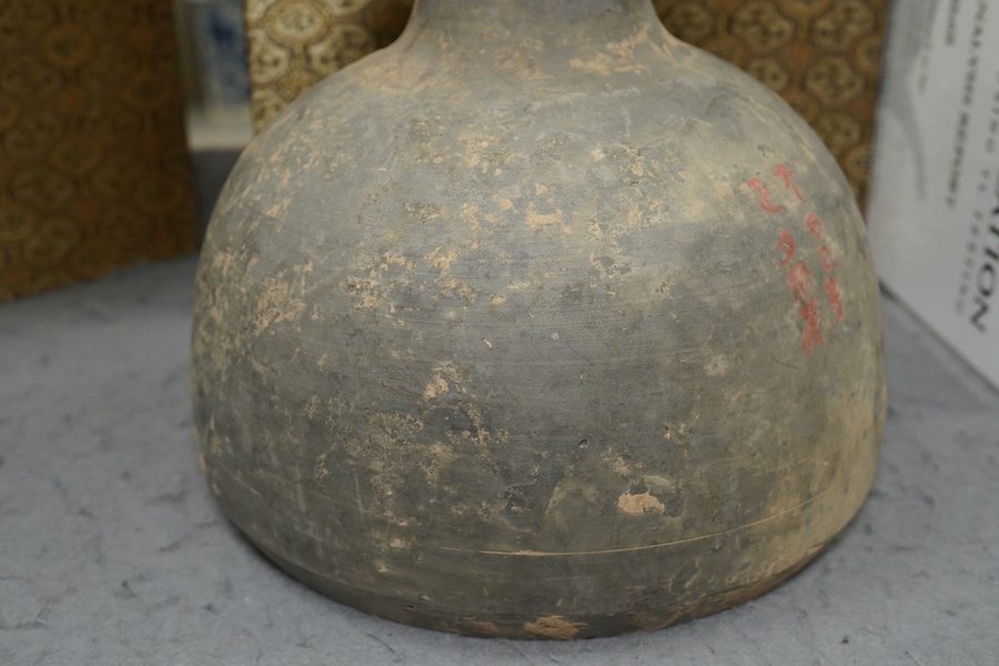 Four very rare Chinese inscribed pottery jars, Han dynasty